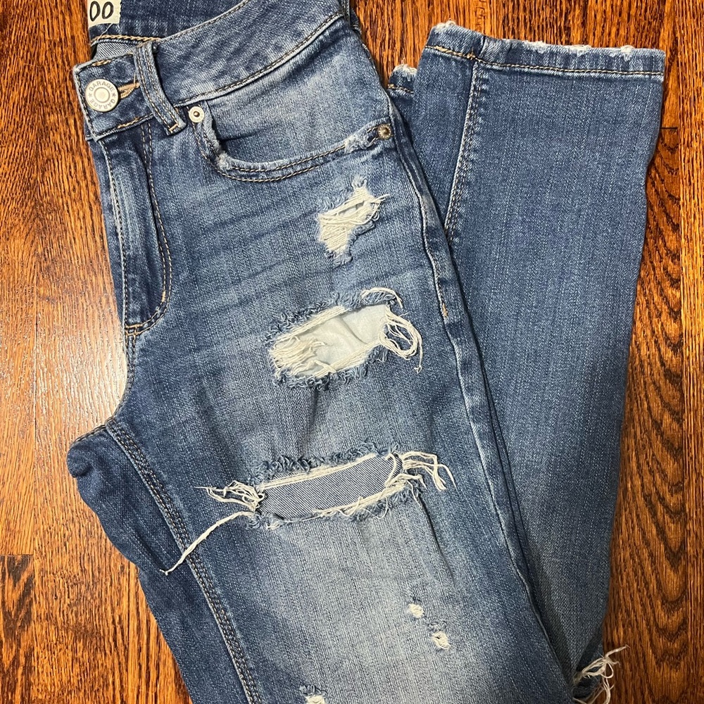 garage girlfriend jeans. medium wash & distressed.